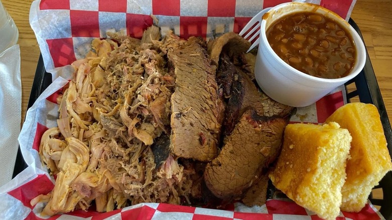 A platter of meats and sides from LD's BBQ
