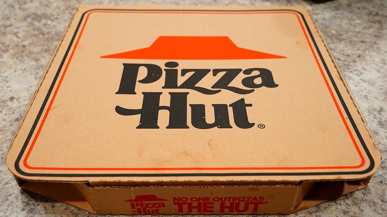 Pizza Hut pizza box on a counter